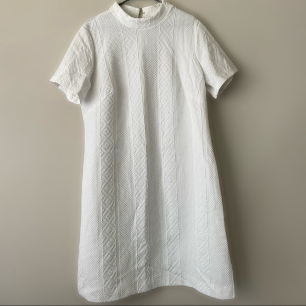 White Short Sleeved Fit and Flare Dress with High Round Collar